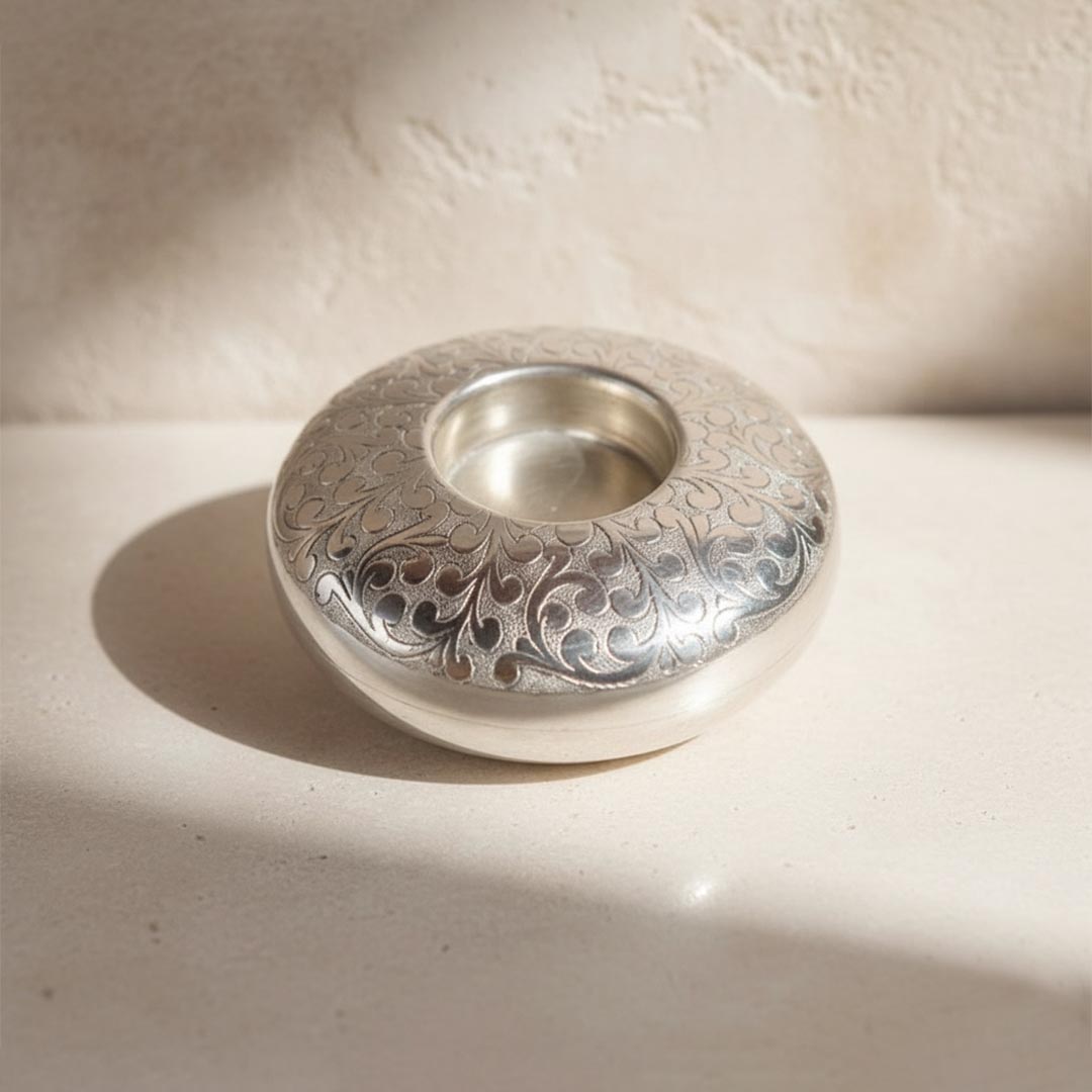 Handcrafted Moroccan chiseled nickel silver candle holder with floral pattern